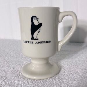 Vintage Little America Cream Ceramic Pedestal Mug W Penguin